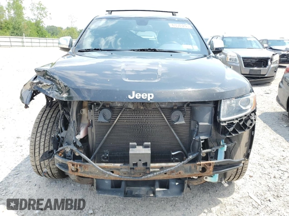 2014 Jeep Grand Cherokee Limited с VIN 1C4RJFBG3EC440429, выставлен на аукционе Copart как лот 63549245 с пробегом 162 178 миль миль и Списание • Salvage title. История ставок и продаж доступна на DreamBid. Изображение 5.