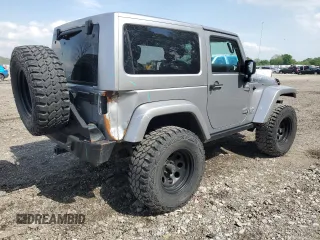 2014 Jeep Wrangler Sahara with VIN 1C4AJWBG0EL241643, listed as a Copart auction lot 56491155 with 113,596 mi miles and Salvage title. Bid and sale history available at DreamBid. Image 3.