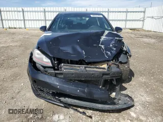 2015 Volkswagen GTI SE z VIN 3VW5T7AU1FM003452, wystawiony jako Copart lot #58655765 z przebiegiem 134 728 mil mil oraz Szkoda całkowita • Salvage title. Historia ofert i sprzedaży dostępna na DreamBid. Obrazek 5.