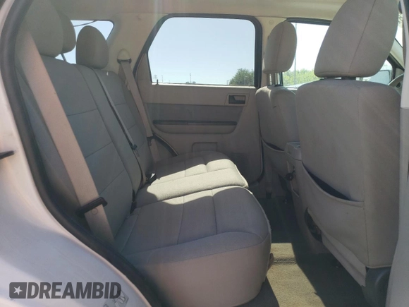 2012 Ford Escape XLT z VIN 1FMCU9DG5CKC08988, wystawiony jako Copart lot #60741765 z przebiegiem 93 114 mil mil oraz Czysty tytuł • Clean title. Historia ofert i sprzedaży dostępna na DreamBid. Obrazek 11.