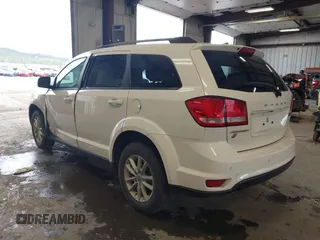 2018 Dodge Journey SXT with VIN 3C4PDDBGXJT469945, listed as a IAAI auction lot 42266310 with 121,871 mi miles and . Bid and sale history available at DreamBid. Image 3.