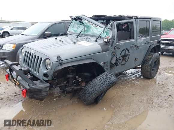 2014 Jeep Wrangler Unlimited Sport with VIN 1C4BJWDG1EL135073, listed as a IAAI auction lot 42435361 with 129,144 mi miles and . Bid and sale history available at DreamBid. Image 2.