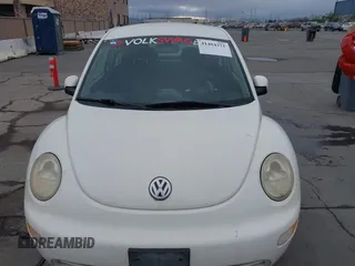 2003 Volkswagen New Beetle Coupe GL with VIN 3VWBK21C33M403802, listed as a IAAI auction lot 41484371 with 148,392 mi miles. Bid and sale history available at carsss.com. Image 6.
