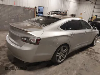 2015 Chevrolet Impala LT with VIN 2G1125S34F9277731, listed as a IAAI auction lot 41835811 with 102,628 mi miles and . Bid and sale history available at DreamBid. Image 4.