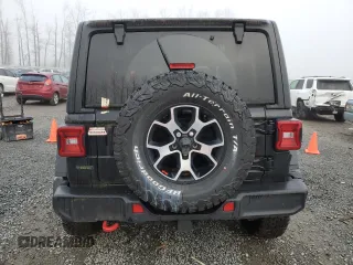 2021 Jeep Wrangler Unlimited Rubicon with VIN 1C4JJXFM7MW818199, listed as a Copart auction lot 87428474 with 18,696 mi miles and Salvage Title. Bid and sale history available at carsss.com. Image 6.