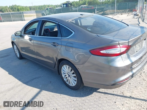 2013 Ford Fusion SE Hybrid with VIN 3FA6P0LU8DR161079, listed as a IAAI auction lot 42064615 with 232,448 mi miles. Bid and sale history available at carsss.com. Image 3.