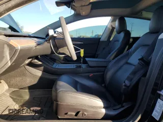 2021 Tesla Model 3 Standard Range Plus with VIN 5YJ3E1EA5MF082272, listed as a Copart auction lot 88724475 with 22,613 mi miles and Salvage Title. Bid and sale history available at carsss.com. Image 7.