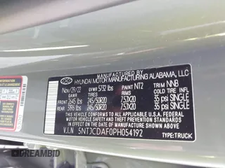2023 Hyundai Santa Cruz Night Edition z VIN 5NTJCDAF0PH054192, wystawiony jako IAAI lot #40734723 z przebiegiem 9 700 mil mil oraz . Historia ofert i sprzedaży dostępna na DreamBid. Obrazek 9.