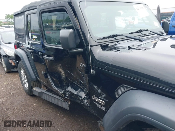 2018 Jeep Wrangler Unlimited Sport S with VIN 1C4HJXDG3JW150232, listed as a IAAI auction lot 42379385 with 60,679 mi miles and . Bid and sale history available at DreamBid. Image 6.
