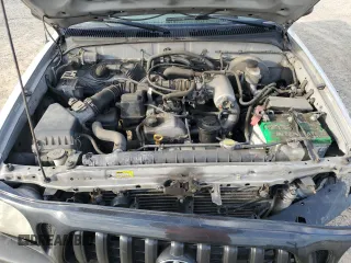 2004 Toyota Tacoma with VIN 5TENL42NX4Z407973, listed as a Copart auction lot 61962155 with 163,180 mi miles and Salvage title. Bid and sale history available at DreamBid. Image 11.