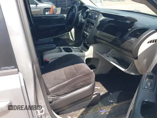2014 Dodge Grand Caravan SXT z VIN 2C4RDGCG3ER128971, wystawiony jako IAAI lot #41921386 z przebiegiem 255 074 mil mil oraz . Historia ofert i sprzedaży dostępna na DreamBid. Obrazek 5.