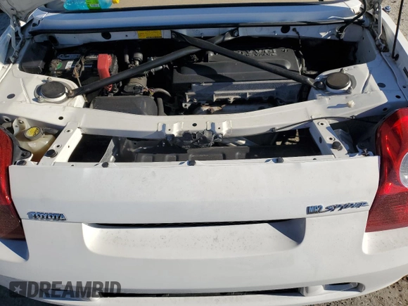 2004 Toyota MR2 z VIN JTDFR320940068690, wystawiony jako Copart lot #86252484 z przebiegiem 151 337 mil mil oraz Szkoda całkowita • Salvage title. Historia ofert i sprzedaży dostępna na DreamBid. Obrazek 11.