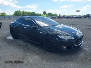 2015 Tesla Model S 85D z VIN 5YJSA1H26FF094638, wystawiony jako IAAI lot #42034723 z przebiegiem 129 764 mil mil oraz . Historia ofert i sprzedaży dostępna na DreamBid. Obrazek 1.