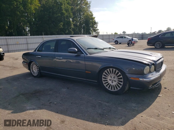 2004 Jaguar XJ with VIN SAJWA71CX4SG32785, listed as a Copart auction lot 69792134 with 183,705 mi miles and Non Repairable. Bid and sale history available at carsss.com. Image 4.