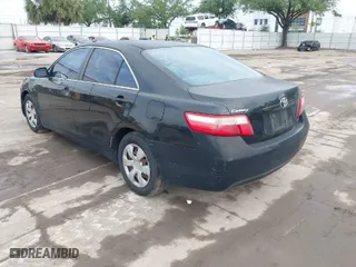 2007 Toyota Camry CE with VIN 4T1BE46K27U513940, listed as a IAAI auction lot 42108691 with 331,435 mi miles. Bid and sale history available at carsss.com. Image 3.