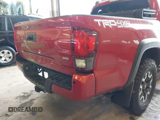 2019 Toyota Tacoma SR z VIN 3TMCZ5AN5KM220079, wystawiony jako IAAI lot #41856695 z przebiegiem 51 918 mil mil oraz . Historia ofert i sprzedaży dostępna na DreamBid. Obrazek 6.