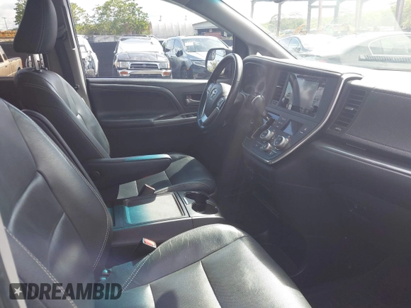 2016 Toyota Sienna SE with VIN 5TDXK3DC9GS719995, listed as a IAAI auction lot 42421273 with 126,943 mi miles and . Bid and sale history available at DreamBid. Image 5.