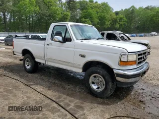 1996 Ford F-150 with VIN 1FTEF14H5TLB47556, listed as a Copart auction lot 51388014 with 117,220 mi miles and Salvage Title. Bid and sale history available at carsss.com. Image 4.