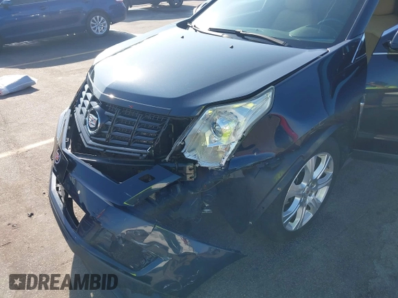 2014 Cadillac SRX Performance Collection with VIN 3GYFNCE39ES613051, listed as a IAAI auction lot 42113063 with 82,952 mi miles and . Bid and sale history available at carsss.com. Image 6.
