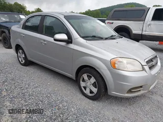 2011 Chevrolet Aveo 1LT with VIN KL1TD5DE8BB249150, listed as a IAAI auction lot 42807292 with 150,308 mi miles and . Bid and sale history available at DreamBid. Image 1.