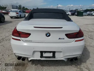 2017 BMW M6 z VIN WBS6G9C59HD932339, wystawiony jako Copart lot #76159614 z przebiegiem 81 987 mil mil oraz Nie do naprawy • Non repairable. Historia ofert i sprzedaży dostępna na DreamBid. Obrazek 6.