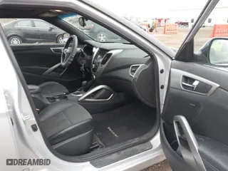 2016 Hyundai Veloster with VIN KMHTC6AD4GU270503, listed as a IAAI auction lot 41982520 with 137,282 mi miles. Bid and sale history available at carsss.com. Image 5.