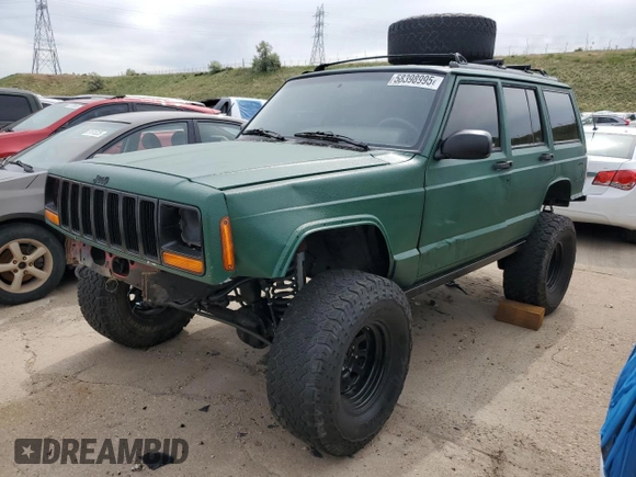 1998 Jeep Cherokee Sport with VIN 1J4FJ68SXWL210381, listed as a Copart auction lot 58398995 with 211,870 mi miles and Salvage title. Bid and sale history available at DreamBid. Image 1.