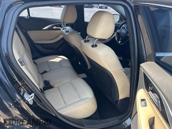 2018 Infiniti QX30 Premium with VIN SJKCH5CR4JA044802, listed as a Copart auction lot 59876905 with 89,177 mi miles and Clean title. Bid and sale history available at DreamBid. Image 6.