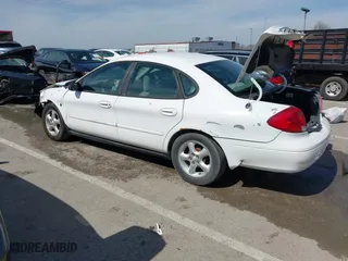 2000 Ford Taurus SE with VIN 1FAFP5327YA186258, listed as a IAAI auction lot 41795342 with 123,174 mi miles. Bid and sale history available at carsss.com. Image 3.