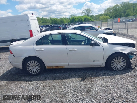 2011 Ford Fusion Hybrid with VIN 3FADP0L37BR264635, listed as a IAAI auction lot 42204672 with 147,326 mi miles and . Bid and sale history available at DreamBid. Image 14.