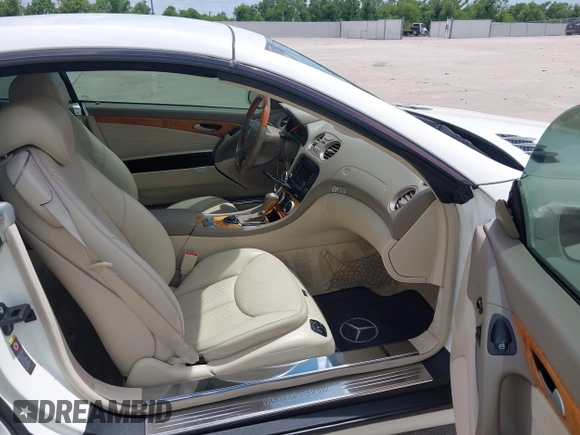 2007 Mercedes-Benz SL 550 with VIN WDBSK71F57F126438, listed as a IAAI auction lot 42743122 with 62,978 mi miles and . Bid and sale history available at DreamBid. Image 5.