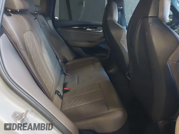 2023 BMW X3 M with VIN 5YM13EC09P9P65368, listed as a IAAI auction lot 41750837 with 27,708 mi miles and . Bid and sale history available at DreamBid. Image 8.