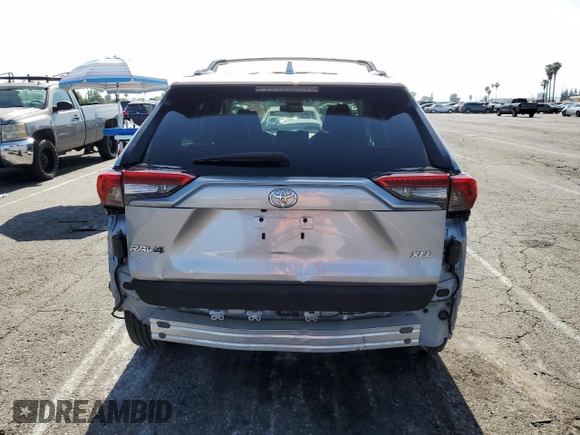 2021 Toyota RAV4 XLE Premium with VIN 2T3C1RFV4MC148429, listed as a Copart auction lot 58264395 with 26,799 mi miles and Salvage title. Bid and sale history available at DreamBid. Image 6.