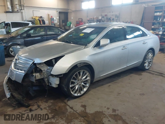 2013 Cadillac XTS Platinum with VIN 2G61V5S31D9190738, listed as a IAAI auction lot 41657461 with 136,924 mi miles and . Bid and sale history available at carsss.com. Image 18.