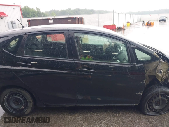 2015 Honda Fit LX with VIN 3HGGK5H56FM760513, listed as a IAAI auction lot 42431169 with 69,841 mi miles and . Bid and sale history available at DreamBid. Image 14.