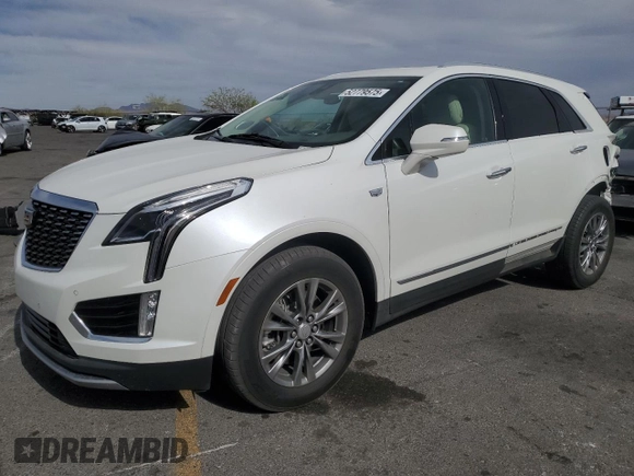 2021 Cadillac XT5 FWD Premium Luxury with VIN 1GYKNCRS0MZ110560, listed as a Copart auction lot 52779575 with 44,559 mi miles and Salvage title. Bid and sale history available at DreamBid. Image 1.