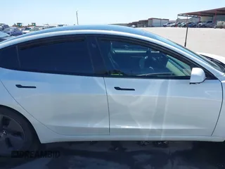 2023 Tesla Model 3 z VIN 5YJ3E1EA0PF608506, wystawiony jako IAAI lot #41748862 z przebiegiem 15 mil mil oraz . Historia ofert i sprzedaży dostępna na DreamBid. Obrazek 13.