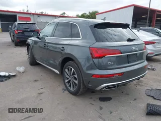 2023 Audi Q5 S line Premium Plus z VIN WA1EAAFY6P2161080, wystawiony jako IAAI lot #41282613 z przebiegiem 20 268 mil mil oraz . Historia ofert i sprzedaży dostępna na DreamBid. Obrazek 3.