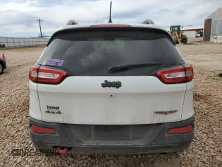2014 Jeep Cherokee Trailhawk with VIN 1C4PJMBS7EW183855, listed as a Copart auction lot 46143085 with 146,901 mi miles and Salvage Title. Bid and sale history available at DreamBid. Image 6.