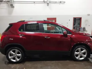 2016 Chevrolet Trax LTZ with VIN 3GNCJRSB9GL166289, listed as a IAAI auction lot 41674434 with 157,109 mi miles. Bid and sale history available at carsss.com. Image 13.