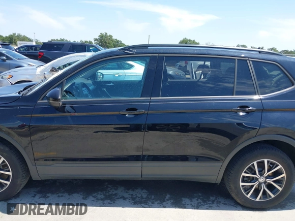 2021 Volkswagen Tiguan S with VIN 3VV1B7AX9MM067347, listed as a IAAI auction lot 42305101 with 77,042 mi miles and . Bid and sale history available at DreamBid. Image 14.