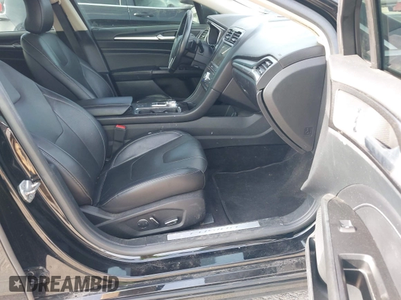 2017 Ford Fusion Titanium with VIN 3FA6P0K91HR257462, listed as a IAAI auction lot 42079361 with 124,914 mi miles and . Bid and sale history available at DreamBid. Image 5.