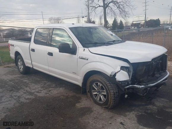 2015 Ford F-150 XLT w/HD Payload Pkg with VIN 1FTFW1EG3FFC39052, listed as a IAAI auction lot 41046847 with 151,061 mi miles. Bid and sale history available at carsss.com. Image 1.