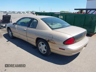 1999 Chevrolet Monte Carlo LS z VIN 2G1WW12M2X9288465, wystawiony jako IAAI lot #42221009 z przebiegiem 62 218 mil mil oraz . Historia ofert i sprzedaży dostępna na DreamBid. Obrazek 3.