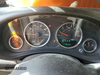 2011 Jeep Wrangler Sport with VIN 1J4AA2D15BL574234, listed as a Copart auction lot 52952605 with 114,642 mi miles and Salvage Title. Bid and sale history available at carsss.com. Image 9.