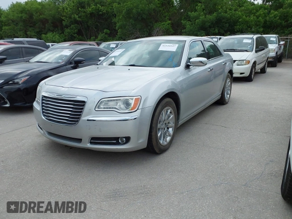 2012 Chrysler 300 Limited with VIN 2C3CCACG9CH223032, listed as a IAAI auction lot 42144147 with 139,625 mi miles. Bid and sale history available at carsss.com. Image 2.