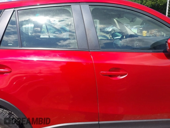 2015 Mazda CX-5 Sport with VIN JM3KE2BE8F0451014, listed as a IAAI auction lot 42536333 with 131,059 mi miles and . Bid and sale history available at DreamBid. Image 13.