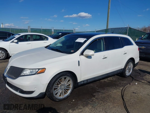2013 Lincoln MKT EcoBoost with VIN 2LMHJ5AT8DBL55167, listed as a IAAI auction lot 41894396 with 121,114 mi miles. Bid and sale history available at carsss.com. Image 17.