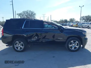 2018 Chevrolet Tahoe LT with VIN 1GNSCBKCXJR132867, listed as a IAAI auction lot 41456319 with 59,131 mi miles and . Bid and sale history available at DreamBid. Image 12.
