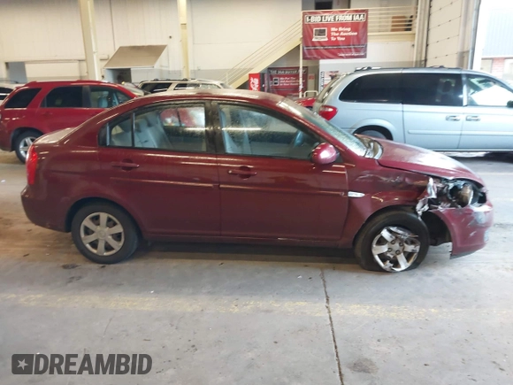 2007 Hyundai Accent GLS with VIN KMHCN46C27U111106, listed as a IAAI auction lot 41383317 with 147,882 mi miles. Bid and sale history available at carsss.com. Image 14.